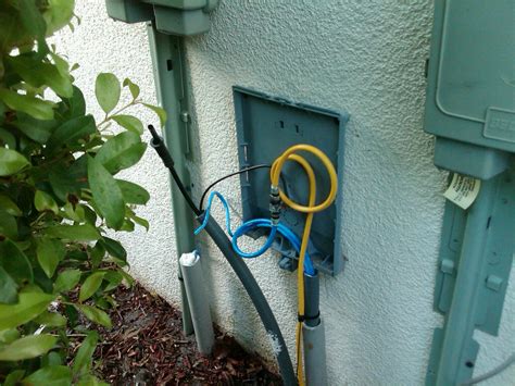 cable box opening outside house